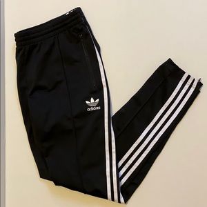 Adidas track pants. Size (Large) 100% polyester